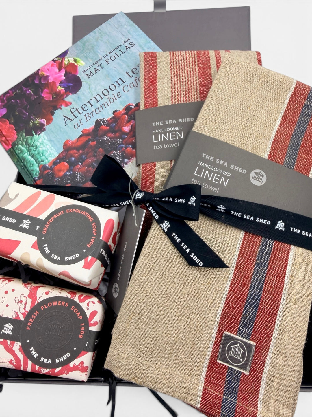 Close-up of the Afternoon Tea hamper tied with black Sea Shed ribbon