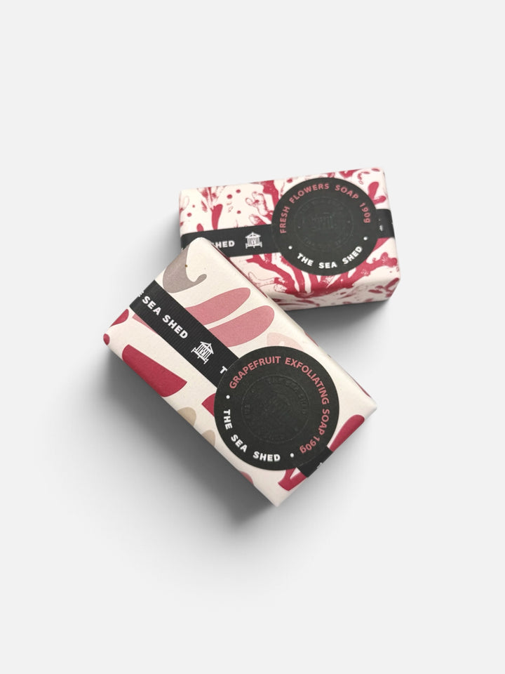 The Sea Shed Grapefruit Exfoliating soap and Fresh Flowers soap, 190g bars in patterned wrapping