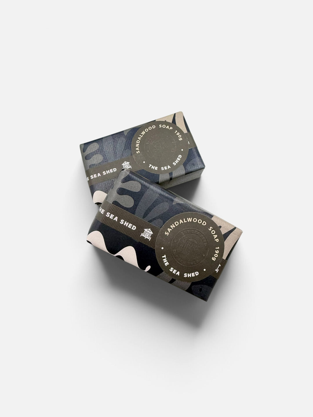 Two The Sea Shed Sandalwood soaps, 190g bars in navy patterned wrapping