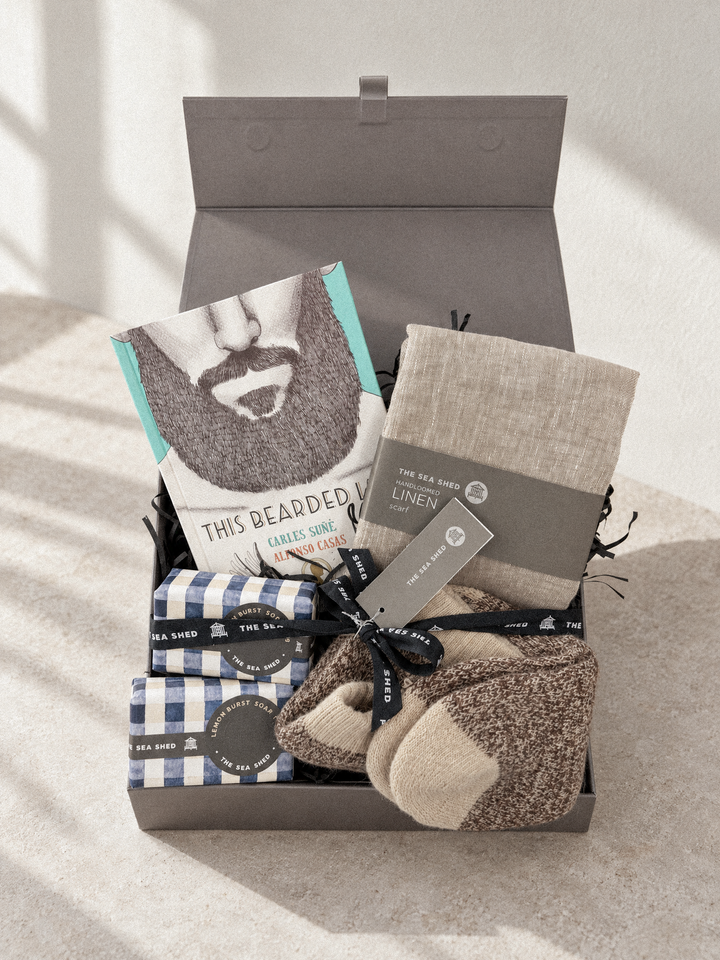 Bearded Life Sand hamper in an open grey keepsake box in soft window light