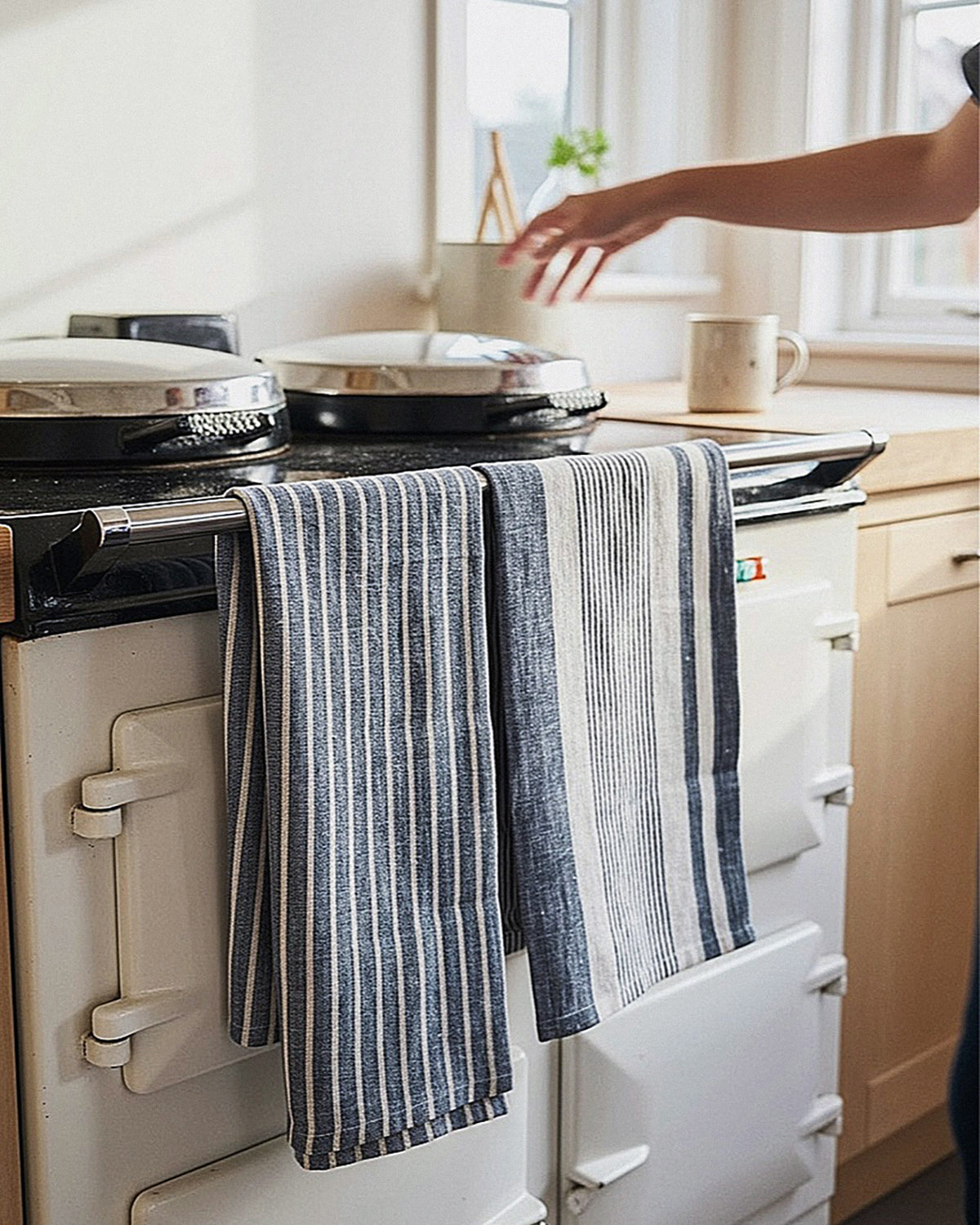Striped towel hanging on a stove in a kitchen setting
Striped linen tea towel
100% linen tea towel
Hand-loomed linen tea towel
Natural linen kitchen towel
Coastal linen tea towel
Linen dish towel UK